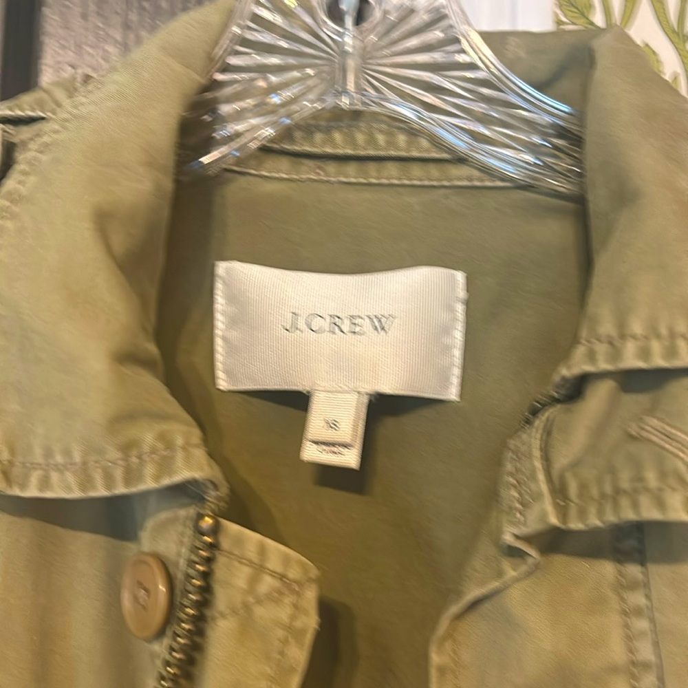 Utility jacket with detachable hood